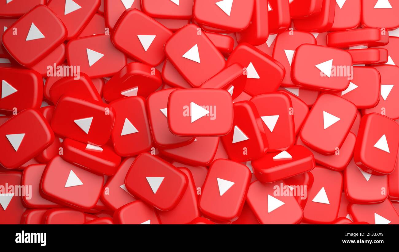 Valencia, Spagna - Marzo, 2021: Un mucchio di pulsanti di riproduzione di YouTube in background di rendering 3D. L'icona del video del tubo, il banner rosso con il simbolo del logo, il simbolo dei social media Foto Stock