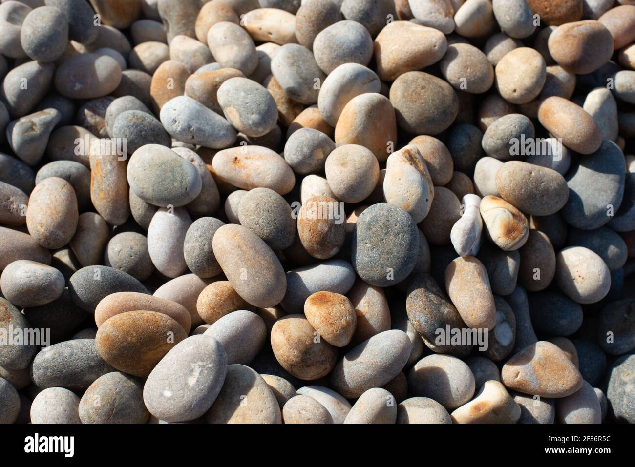 Grandi ondoli vari colori, grigi, creme, bruni e bianchi forme diverse - l'immagine è paesaggio Foto Stock