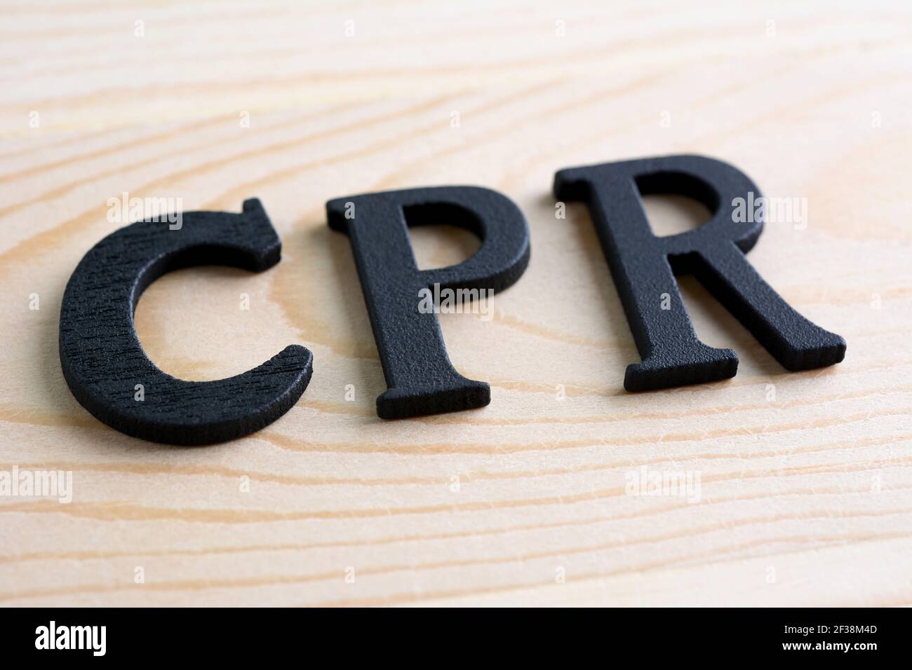 Segno CPR (o rianimazione cardiopolmonare) su sfondo di legno Foto Stock