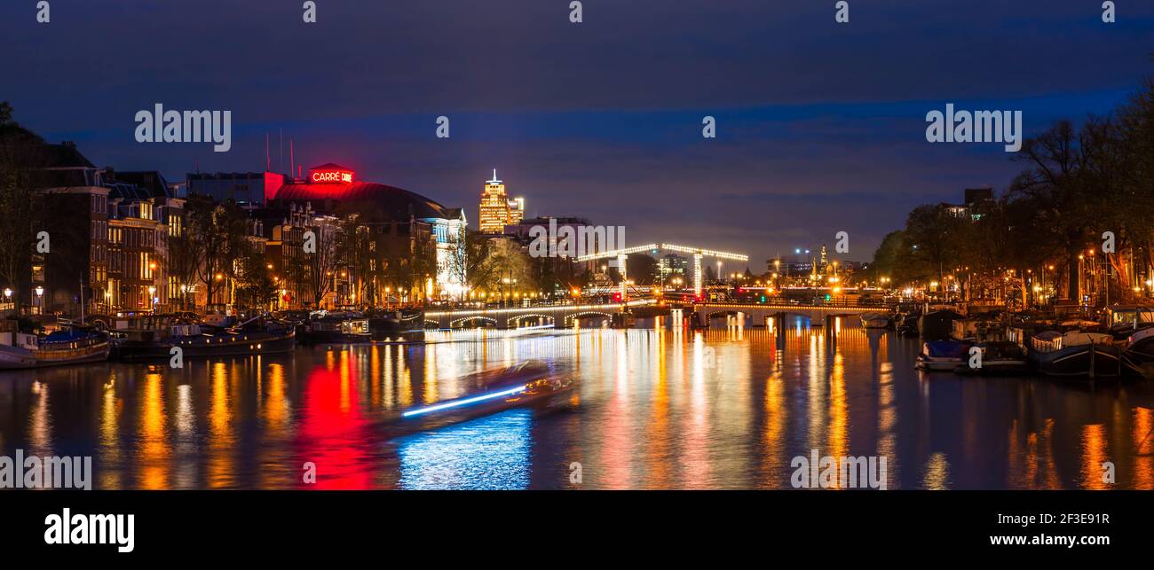 canale di notte ad Amsterdam in Olanda, Paesi Bassi Foto Stock