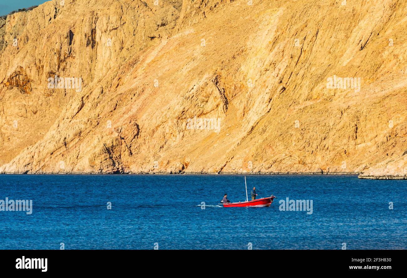 La barca rossa vele Foto Stock