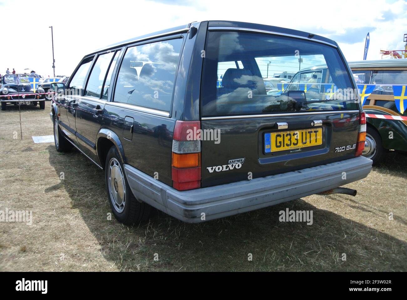 Un 1990 Volvo 740 GLE ha parcheggiato in mostra alla mostra di auto classiche della Costa Azzurra, Paignton, Devon, Inghilterra, UK. Foto Stock