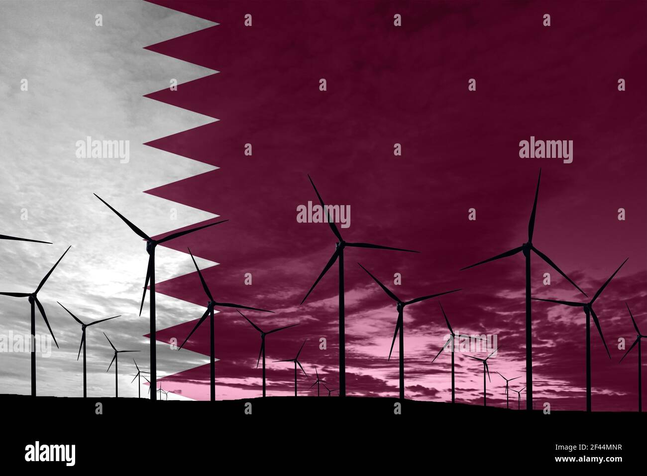 Bandiera Qatar parco eolico al tramonto, sviluppo sostenibile, energia rinnovabile turbine eoliche Foto Stock