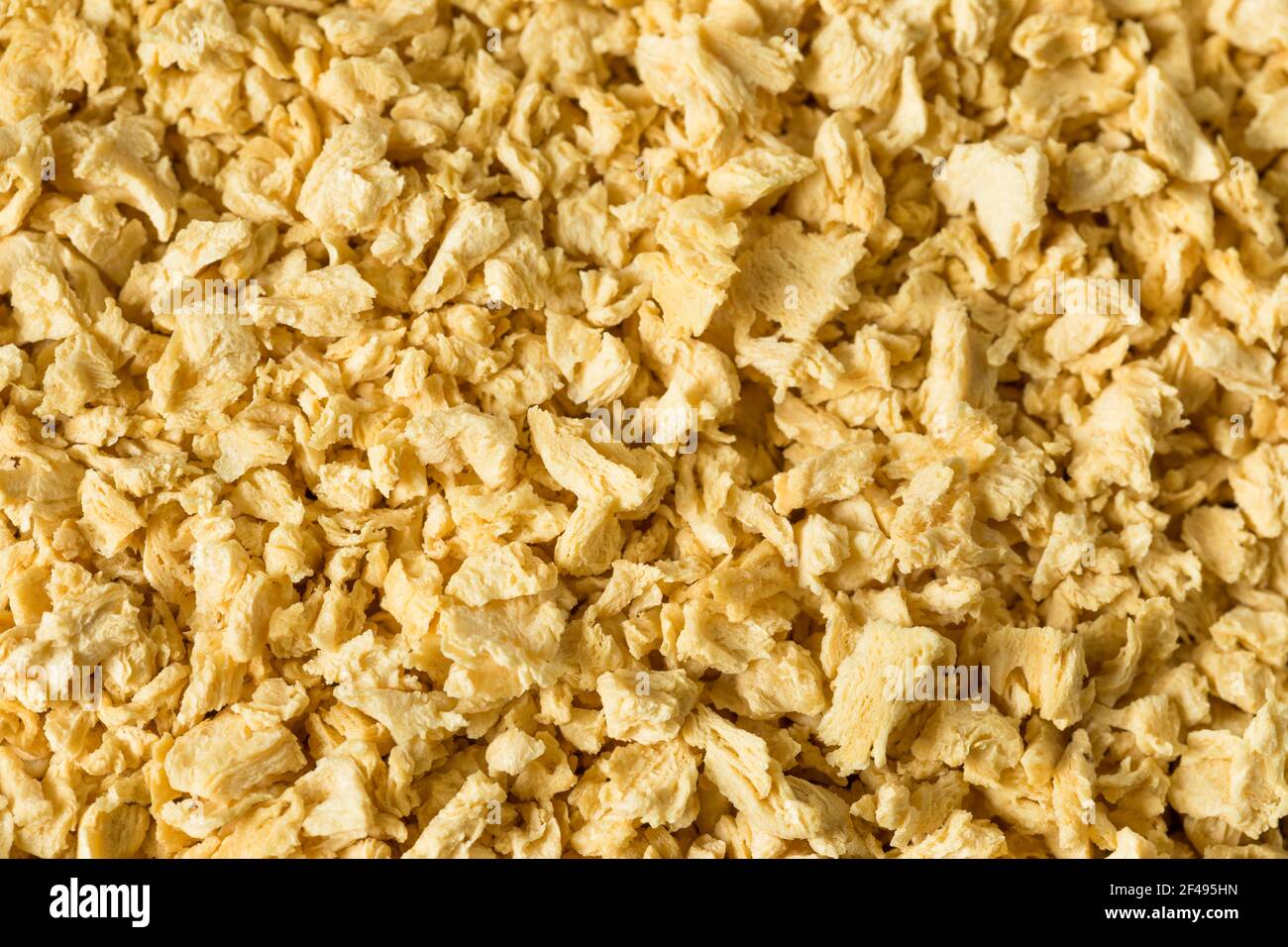 Proteina vegetale grezza organica testurata TVP in una ciotola Foto Stock