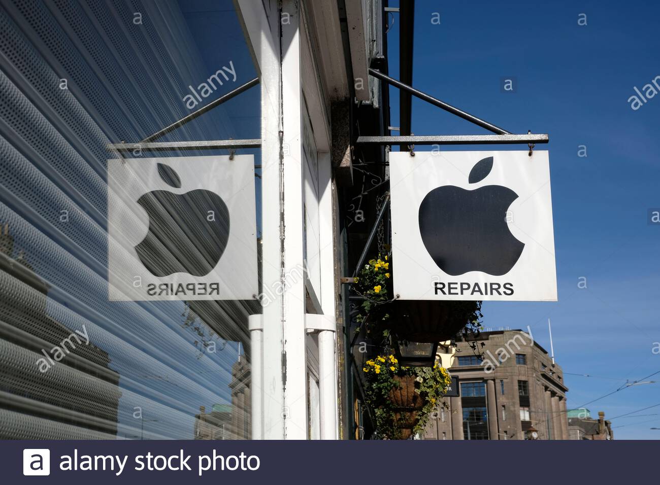 Riparazioni Apple, computer, tablet, cartello del centro di riparazione del telefono cellulare Foto Stock