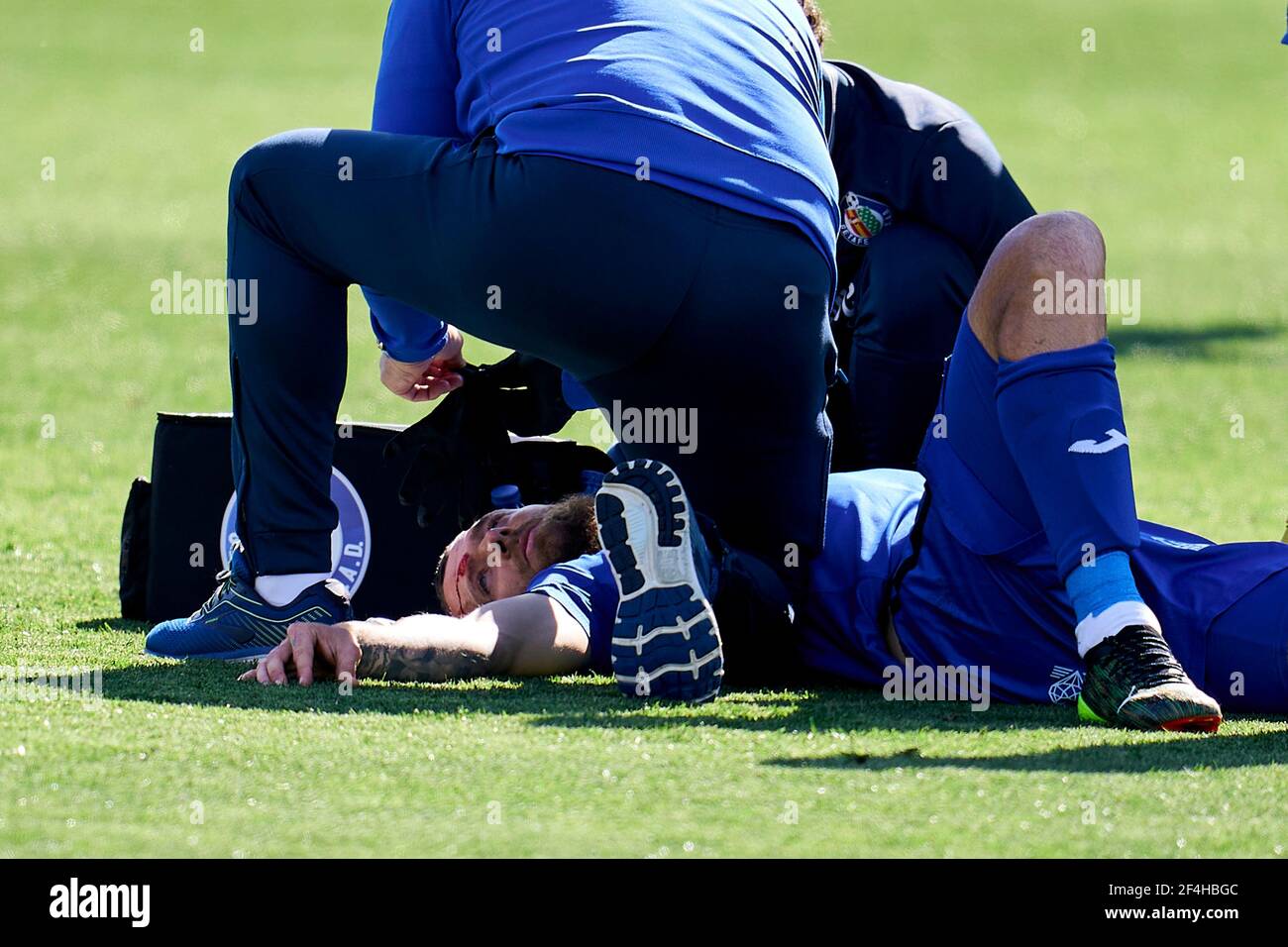 Getafe, Madrid, Spagna. 21 Mar 2021. David Timor del Getafe FC ha ferito durante la Liga match tra Getafe CF e Eche CF al Colosseo Alfonso Perez a Getafe, Spagna. 21 marzo 2021. Credit: Angel Perez/ZUMA Wire/Alamy Live News Foto Stock