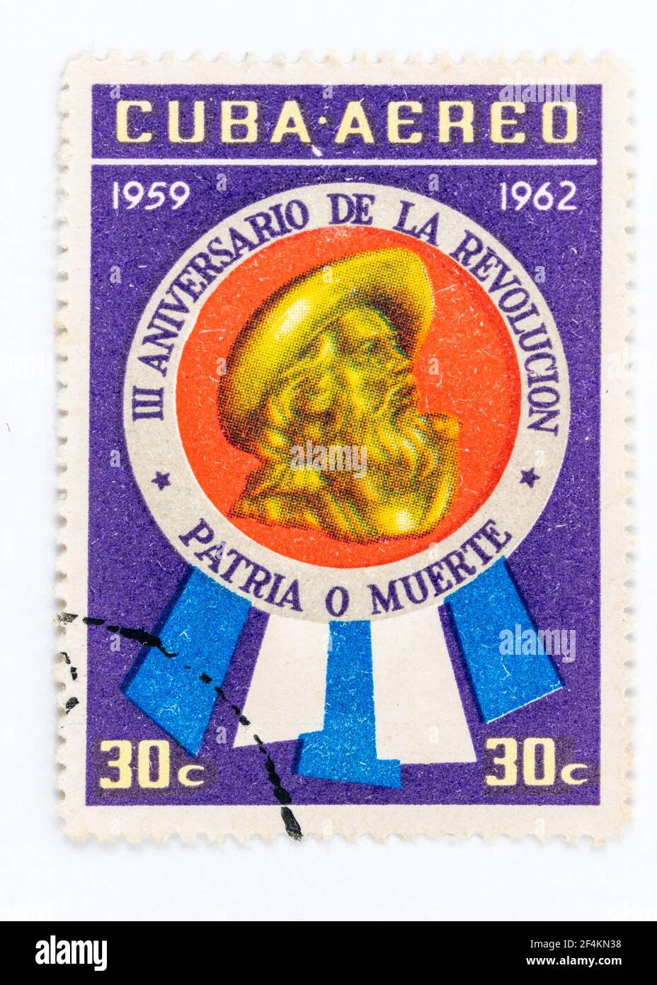 Vecchia serie di francobolli che celebrano il III anniversario della rivoluzione cubana. Il francobollo ha l'immagine di Camilo Cienfuegos. Foto Stock