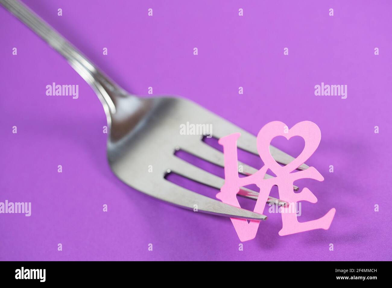 Una forchful di amore. Foto Stock