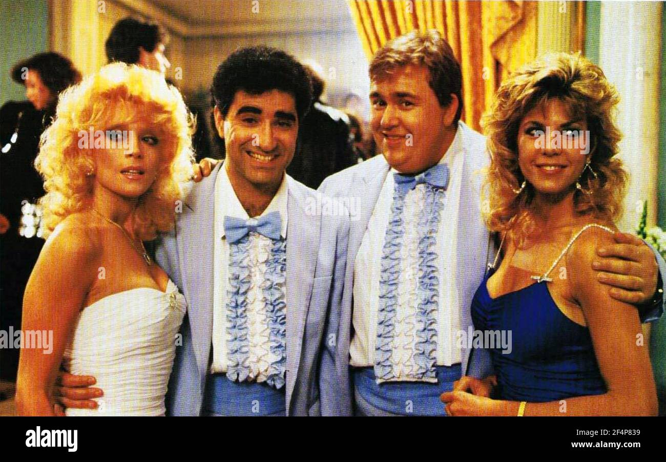 FILM ARMATO E PERICOLOSO 1986 Columbia Pictures con da sinistra: Judy Landers, Eugene Levy, John Candy, K.C.Winkler Foto Stock