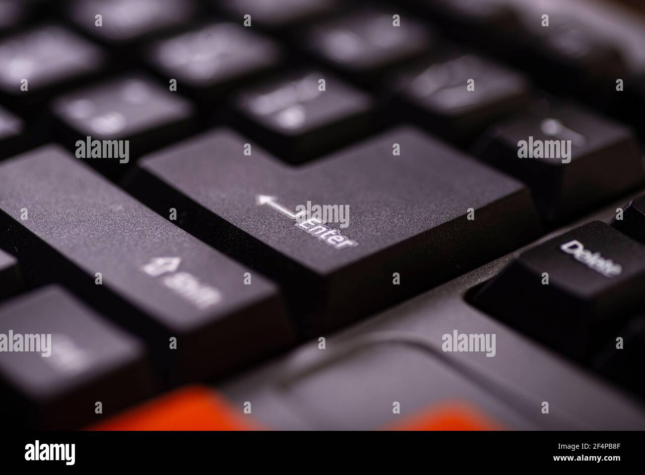 Pulsante di invio primo piano. Primo piano della tastiera del computer. Foto Stock