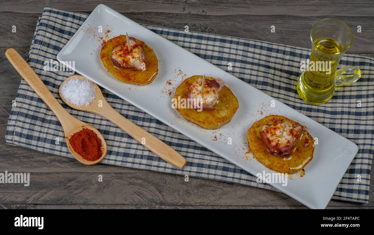 Polpo galiziano tipico cibo spagnolo Foto Stock