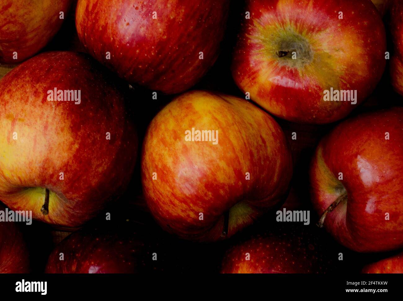 Apple sfondo di mele leggermente rovinate, primo piano. Foto Stock