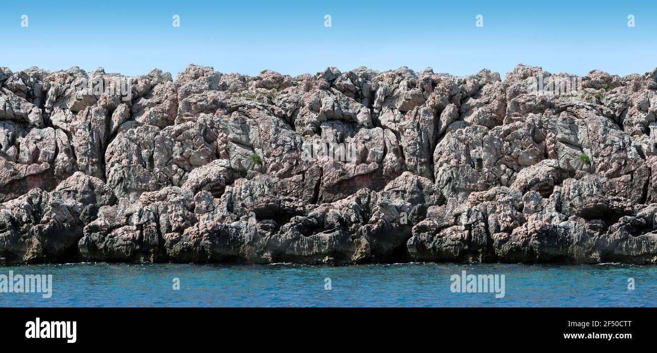Panorama mare senza giunture, rocce e mare. Texture rock senza cuciture. Foto Stock