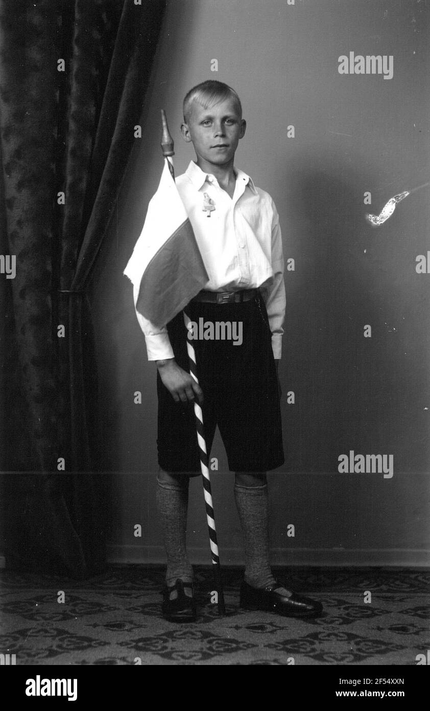 Roßwein. Ragazzo della famiglia e. Nella festa della scuola con bandiera nei colori della classe Foto Stock