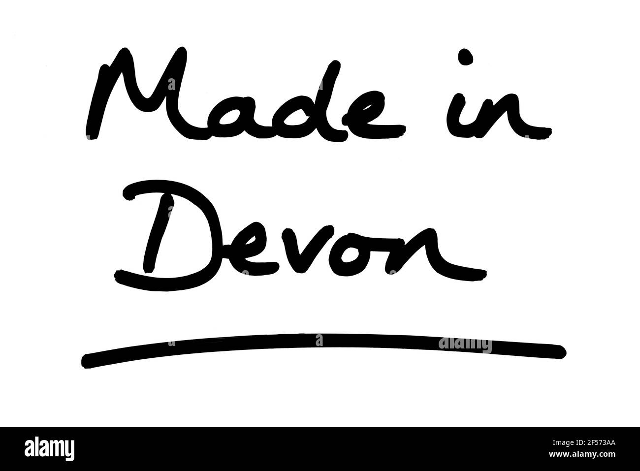Realizzato in Devon, scritto a mano su sfondo bianco. Foto Stock