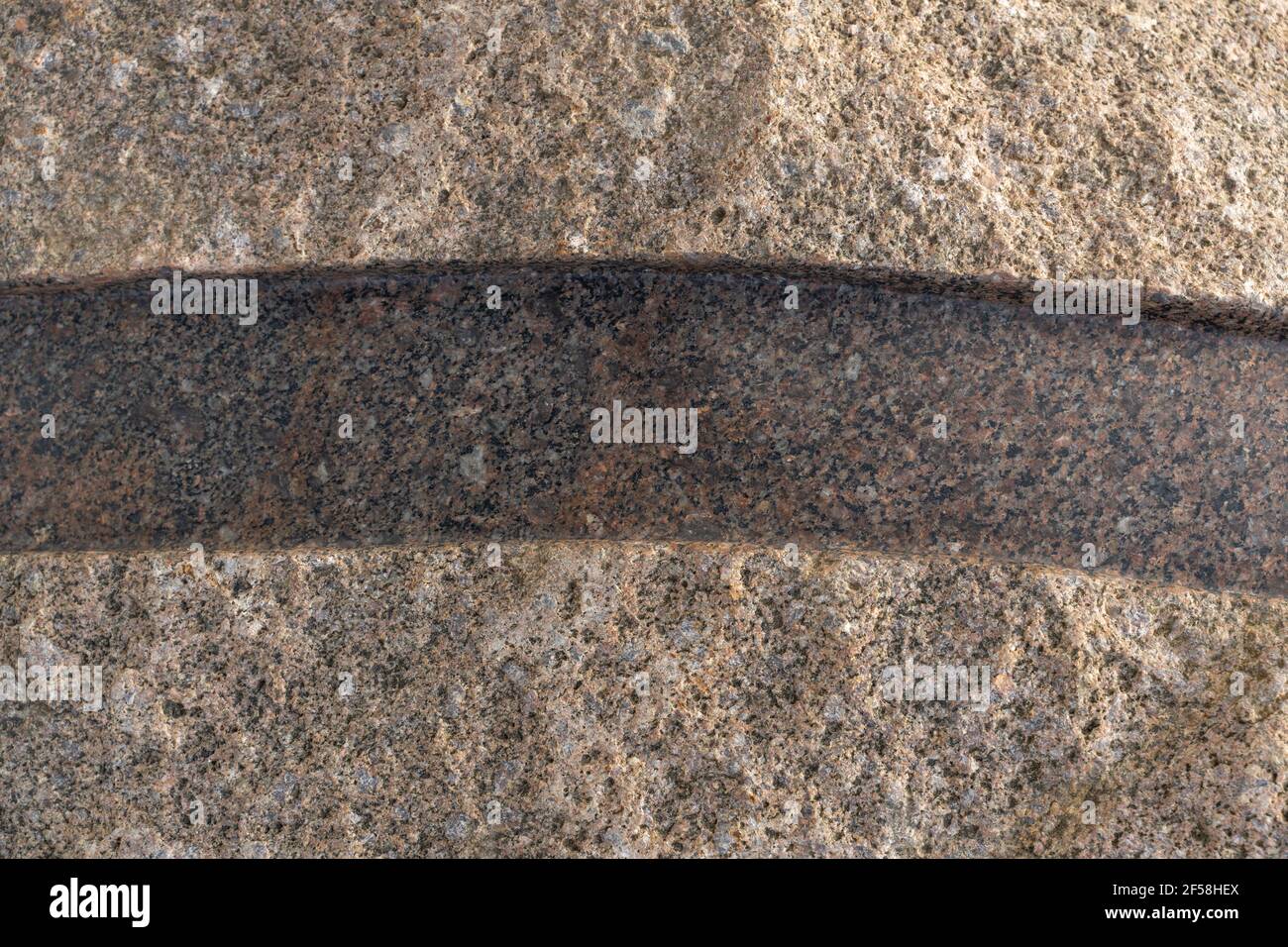 sfondo in pietra con strisce incrociate per il testo. Foto Stock