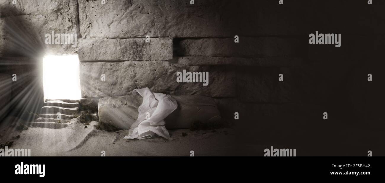 Vuota la tomba mentre la luce splende dall'esterno. Gesù Cristo risurrezione. Concetto di Pasqua cristiana. Foto Stock