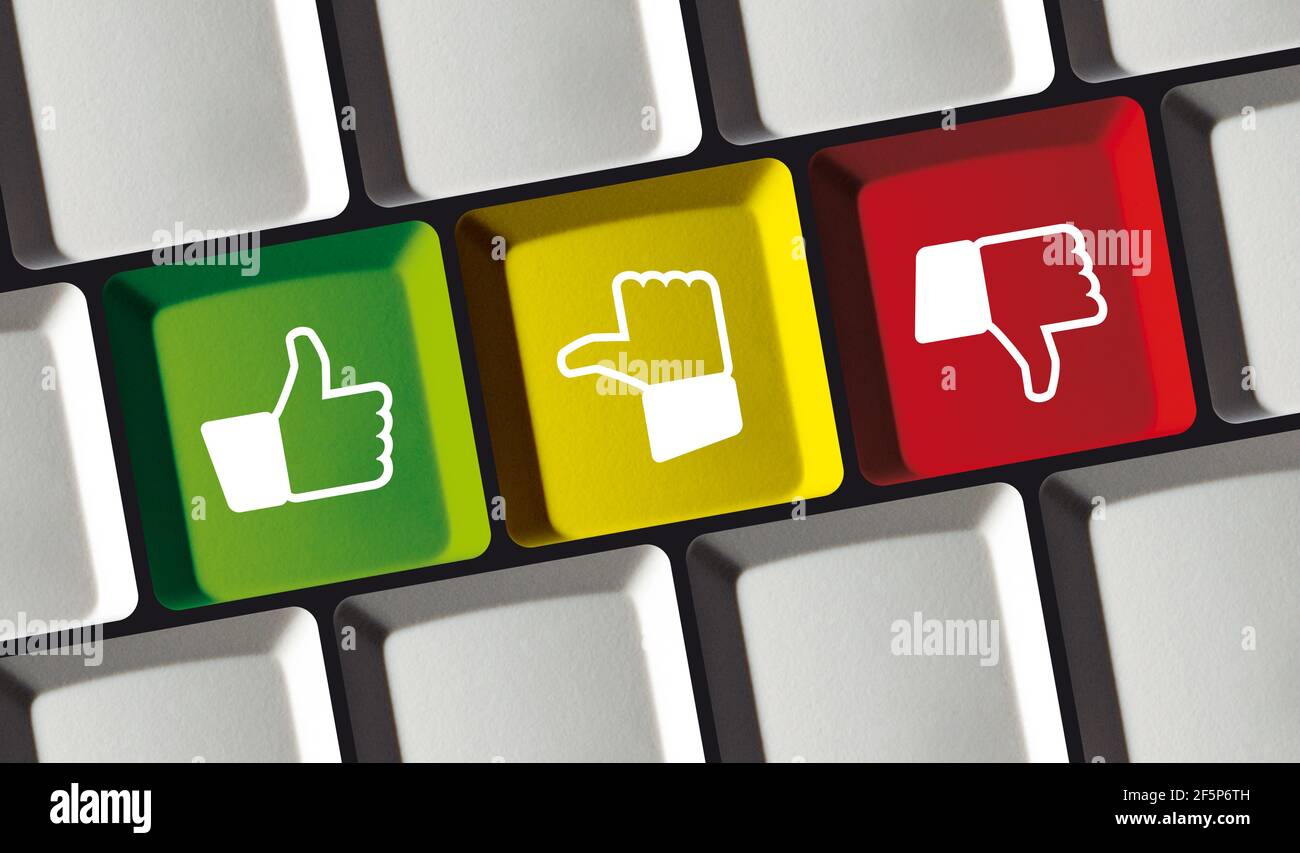Feedback soddisfazione pulsanti thumb up down sulla tastiera del notebook - Revisione concettuale Foto Stock