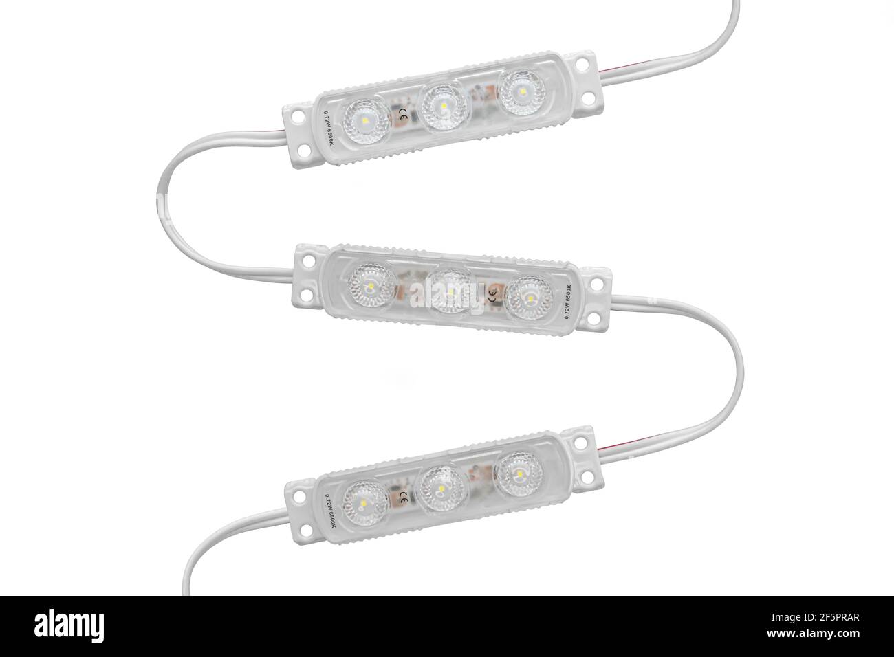 Modulo LED con lente ottica su sfondo bianco isolato Foto Stock