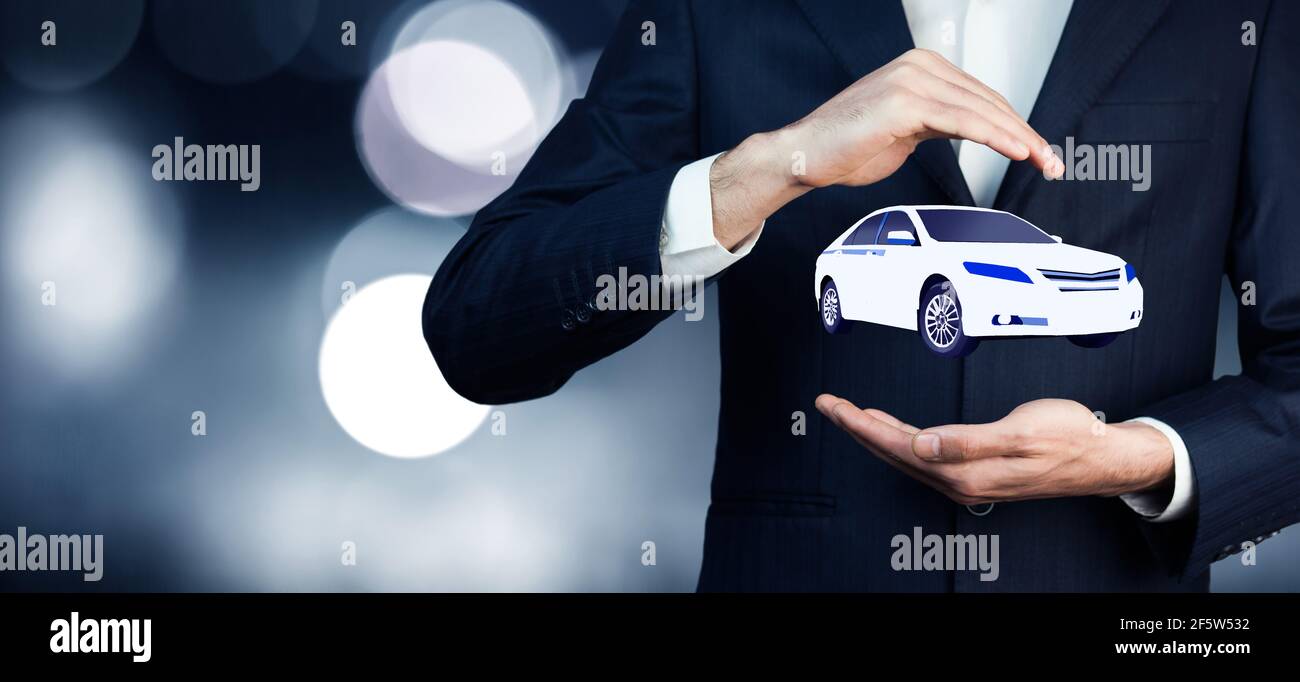 uomo auto a mano Foto Stock