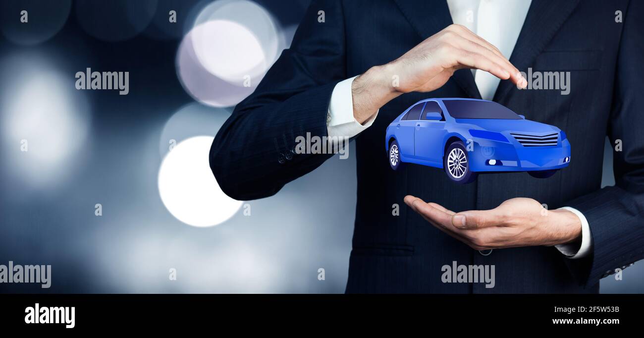 uomo auto a mano Foto Stock