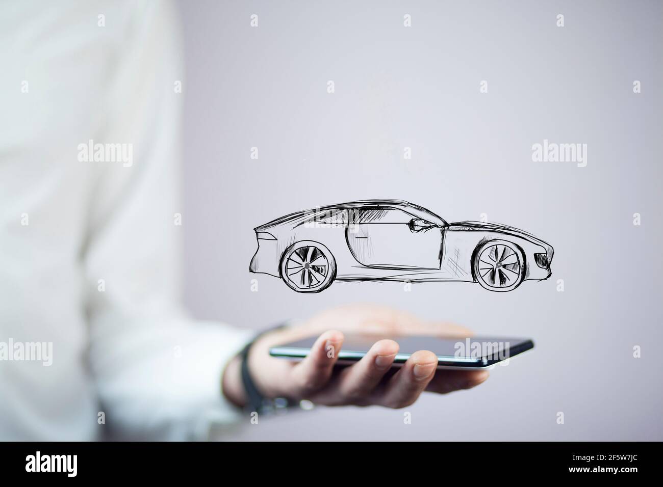 Telefono a mano e auto uomo d'affari. Foto Stock