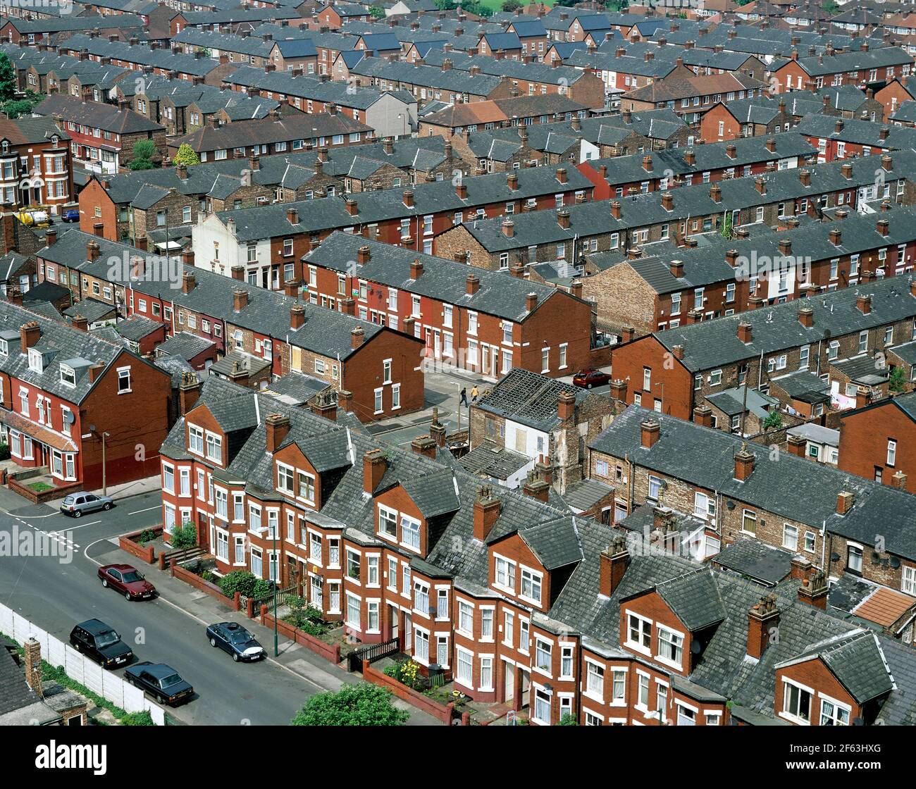 Alloggio a schiera, Longsight, Manchester, M12, fotografato nel 2003. East Road in primo piano. Foto Stock