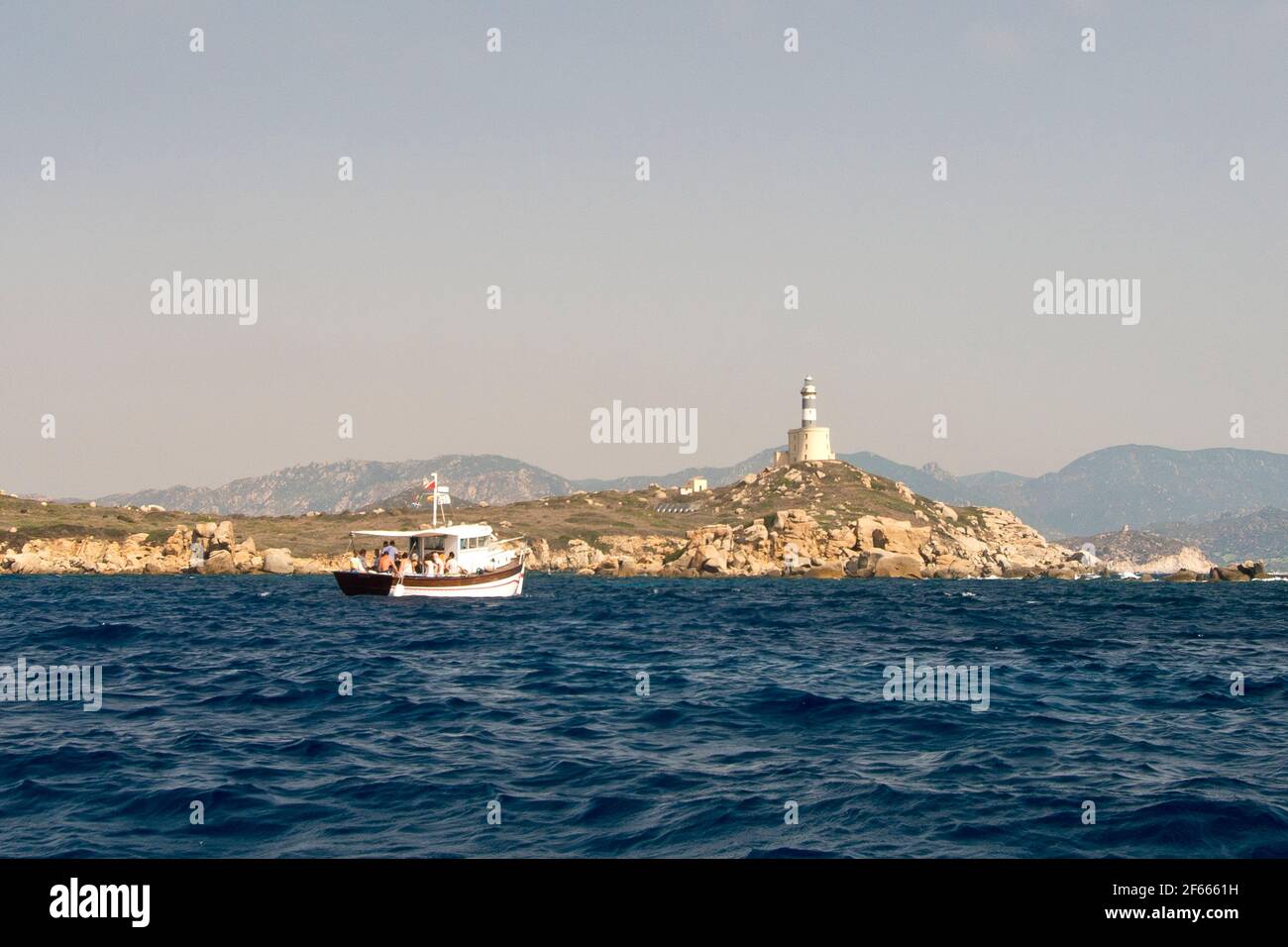 Isola dei Cavoli con faro, Villasimius Foto Stock