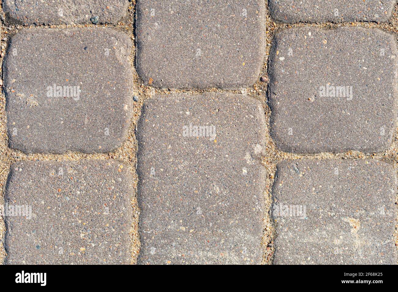 Primo piano delle lastre di pavimentazione, consistenza della pietra di pavimentazione in calcestruzzo, fondo di pietra Foto Stock