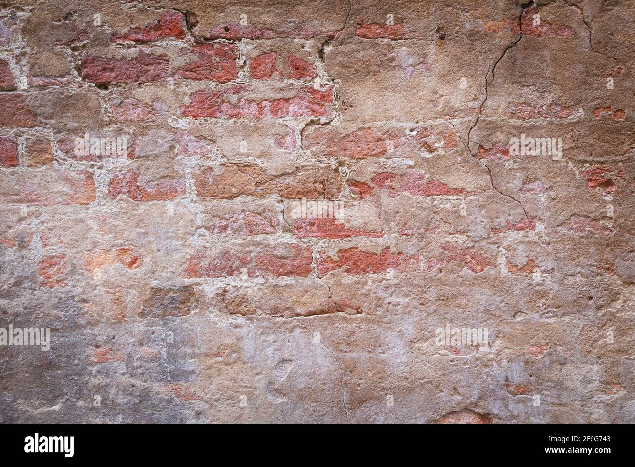 Texture sfondo del vecchio muro rotto sporco di rosso mattone Foto Stock