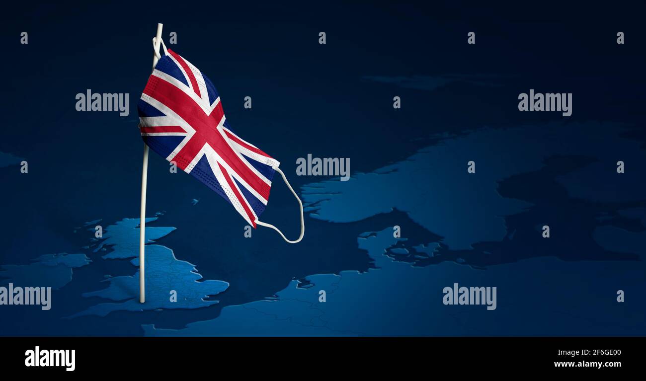 Maschera del Regno Unito su blu la mappa del mondo su sfondo testurizzato. Bandiera ondulata del Regno Unito dipinta su maschera medica sul palo. Flag di attacco del virus. Concetto del ba Foto Stock