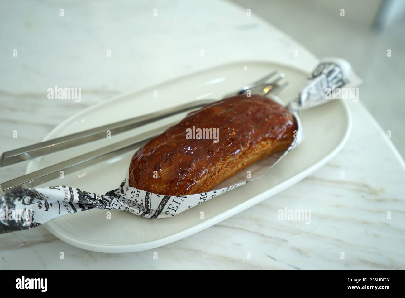 Primo piano Caramellow Eclair (Crema e torta al caramello) Foto Stock