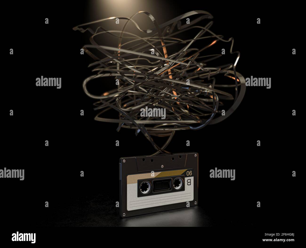 Un concetto che mostra una cassetta audio vintage con un Nastro mobile non ravellato sfondo scuro isolato - rendering 3D Foto Stock