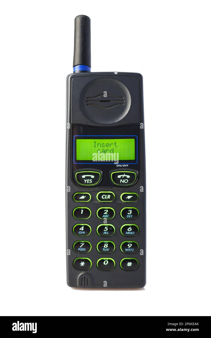 Vecchio cellulare usato, isolato sfondo bianco Foto Stock