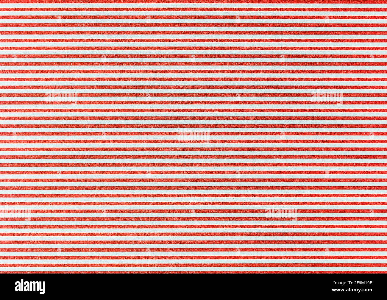 Texture di sfondo astratto rosso chiaro con un motivo di linee orizzontali, sfondo. Foto Stock