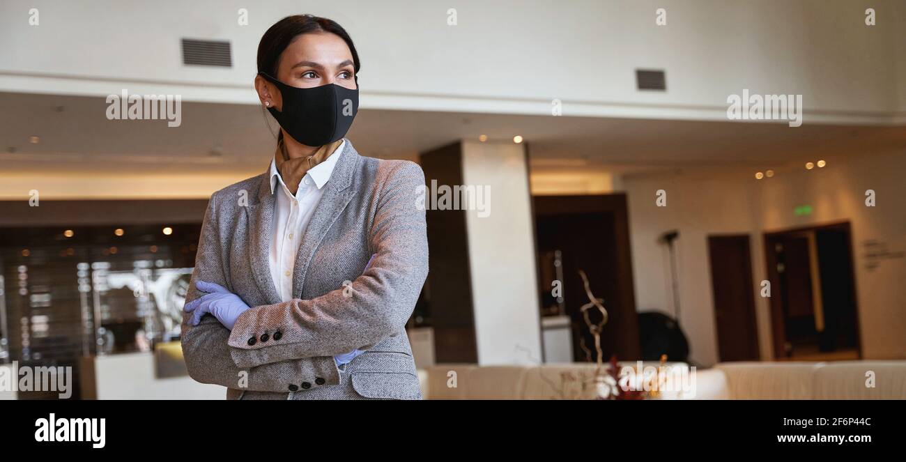 L'amministratore dell'hotel si aspetta che gli ospiti vengano Foto Stock