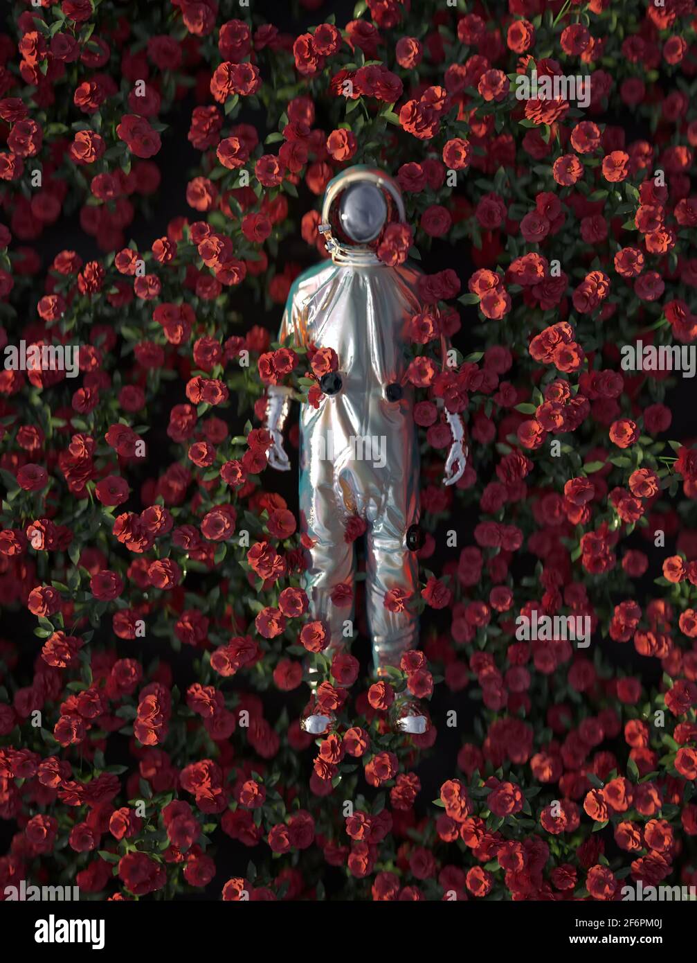 astronauta sdraiato in fiori Foto Stock