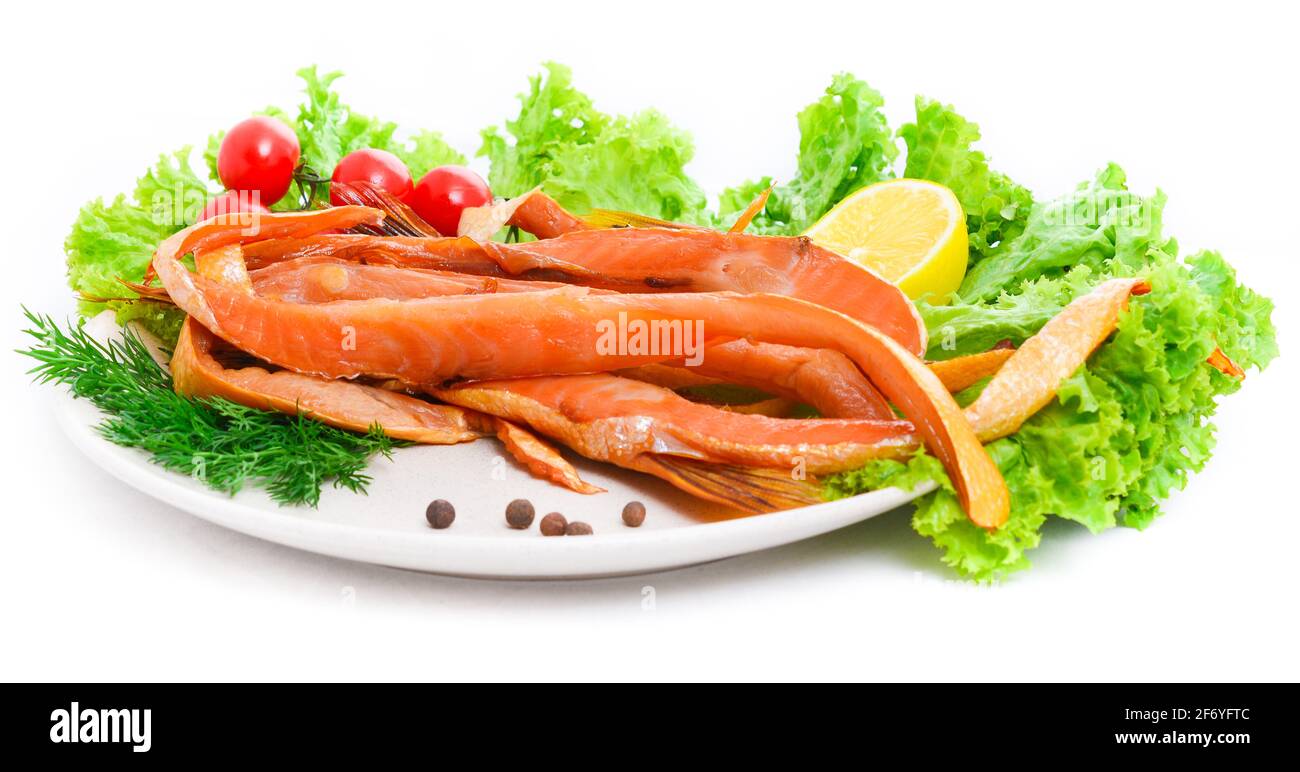 Un sano hamburger di salmone su una piastra Foto stock - Alamy