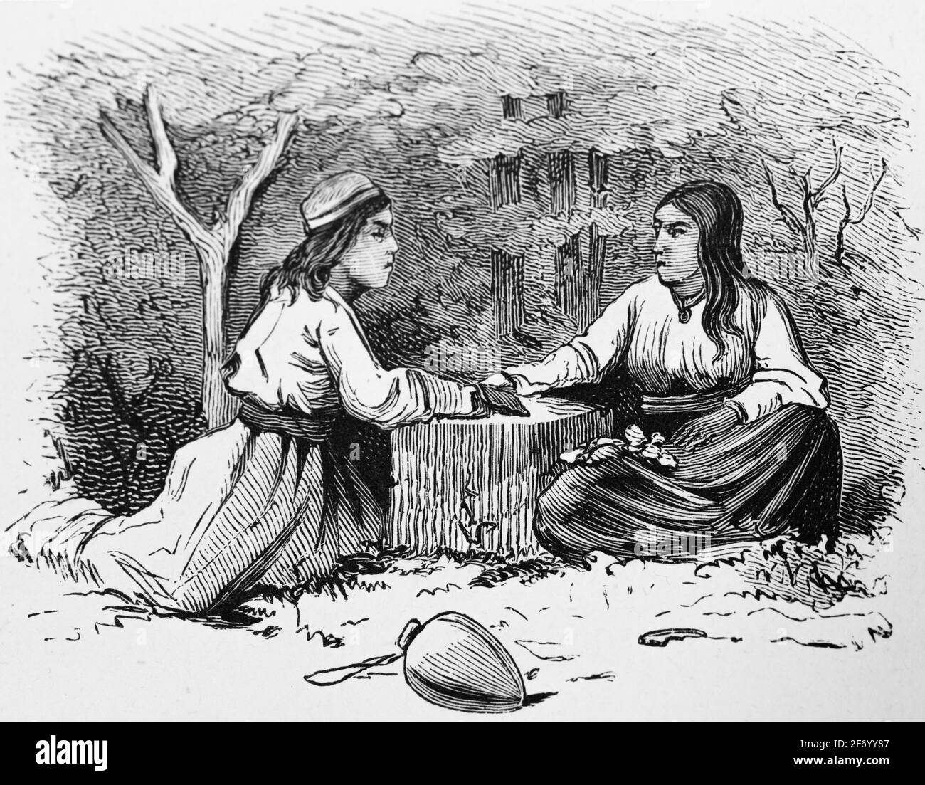 Due donne di Nicobares che siedono ad un tavolo basso che parla, isole di Nicobars, baia del Bengala, India, incisione del legno, Vienna. Lipsia 1881 Foto Stock