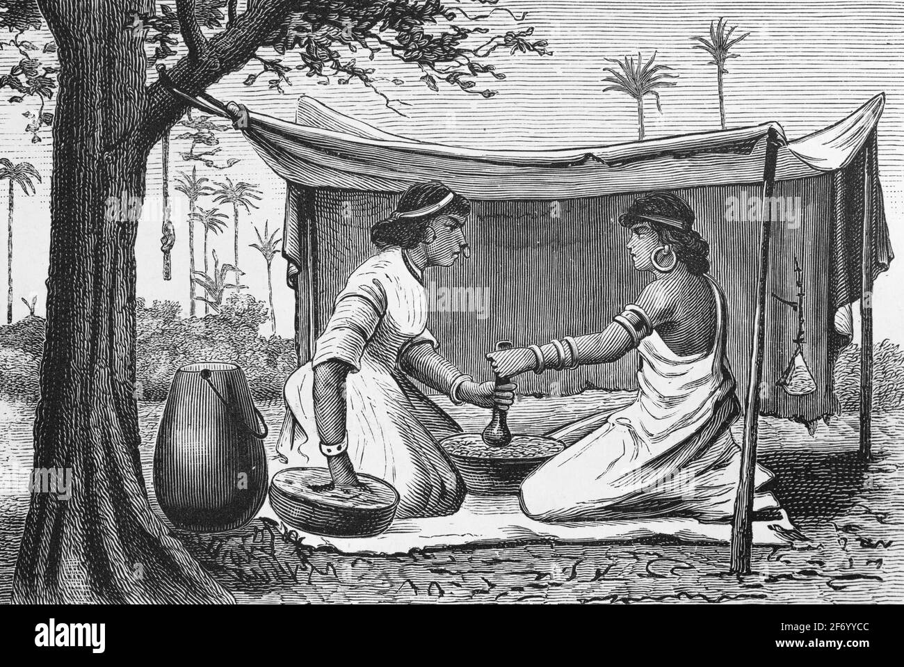 Due telugu donne provenienti dall'India centrale che preparano cibo all'esterno in una piccola tenda, incisione in legno, Wien. Lipsia 1881 Foto Stock