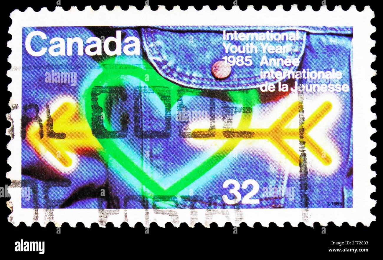 MOSCA, RUSSIA - 28 FEBBRAIO 2021: Francobollo stampato in Canada mostra anno Internazionale della Gioventù, circa 1985 Foto Stock