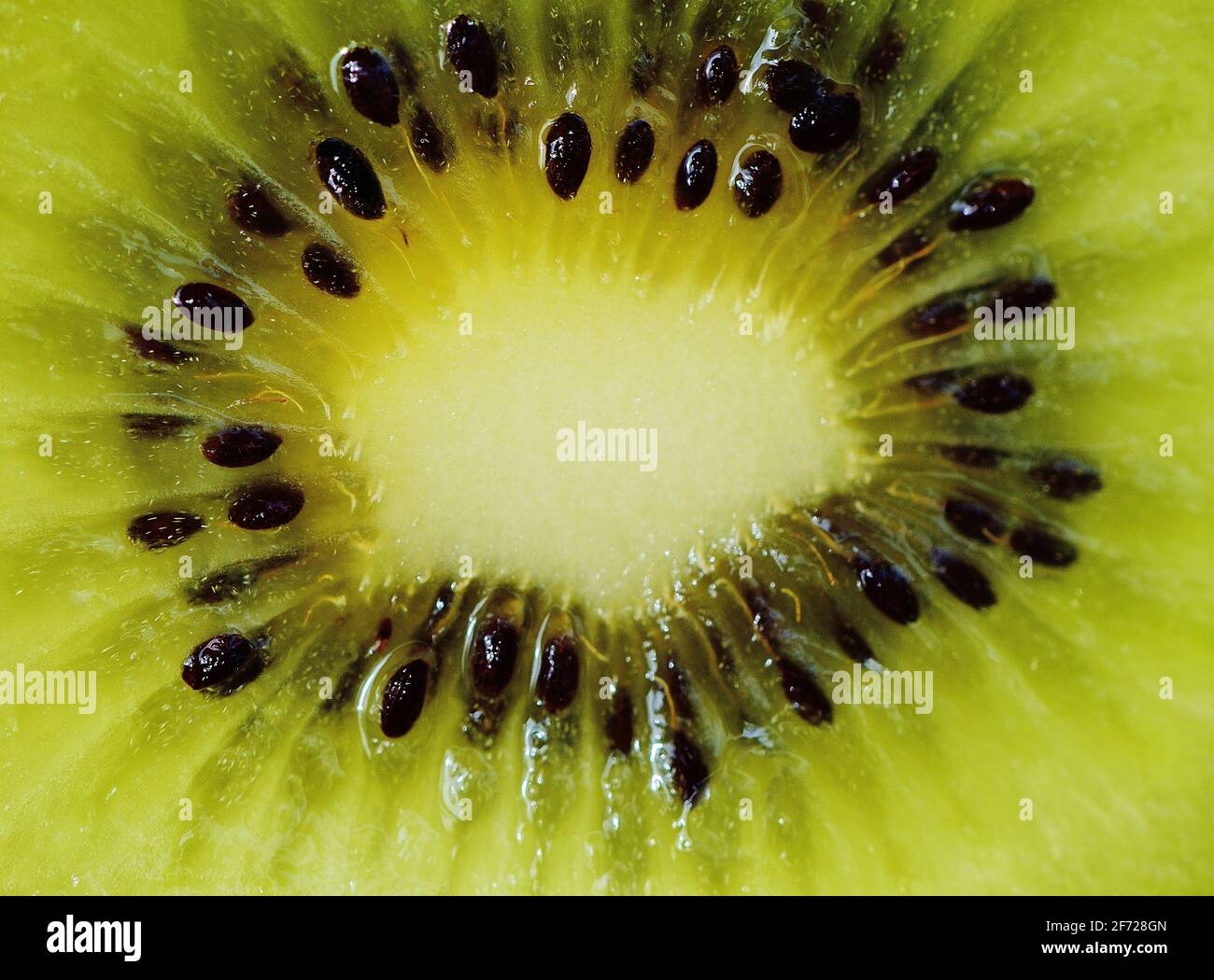 succo fresco di frutta kiwi fetta di primo piano Foto Stock