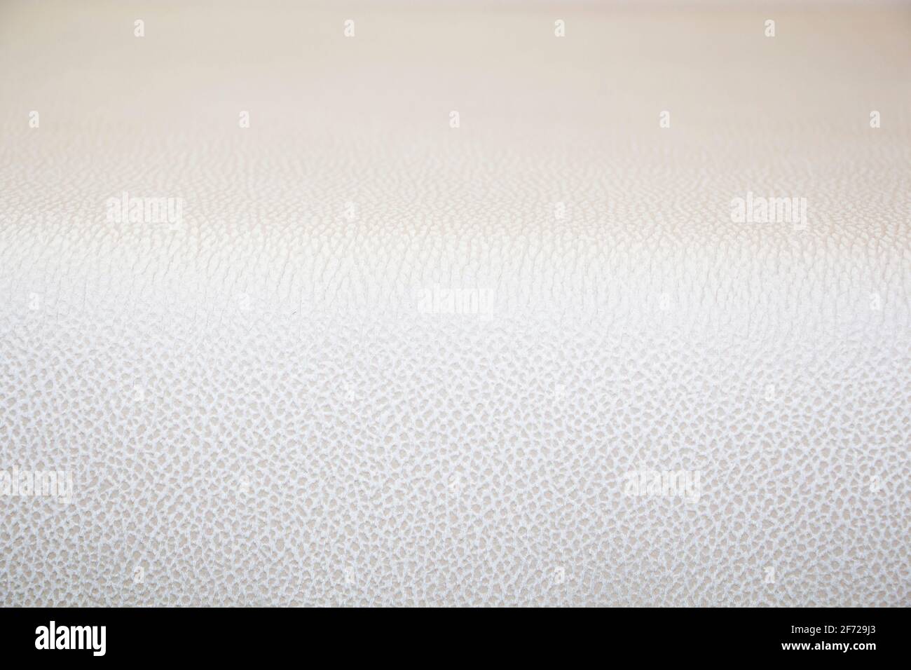 Pezzo di argento, beige faux texture primo piano. Foto Stock