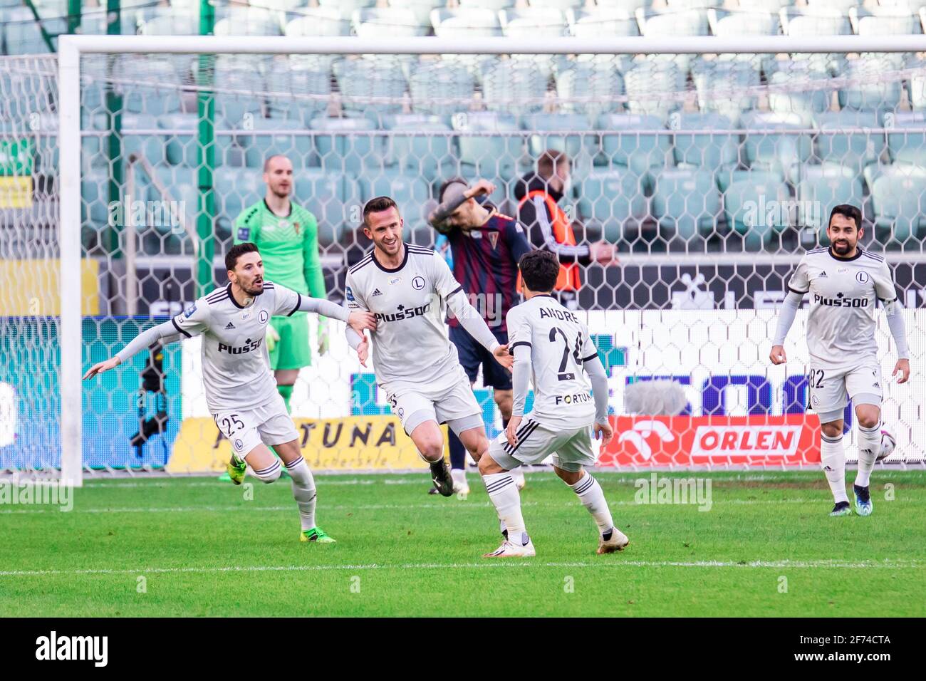 Varsavia, Polonia. 03 Apr 2021. Filip Mladenovic, Tomas Pekhart e Andre Martins di Legia festeggiano un gol durante la partita polacca PKO Ekstraklasa League tra Legia Warszawa e Pogon Szczecin al Marshal Jozef Pilsudski Legia Warsaw Municipal Stadium.(Punteggio finale; Legia Warszawa 4:2 Poaj Szczecin) (Foto di Sipa/USA Live Sipa/Sipa/USA Foto Stock