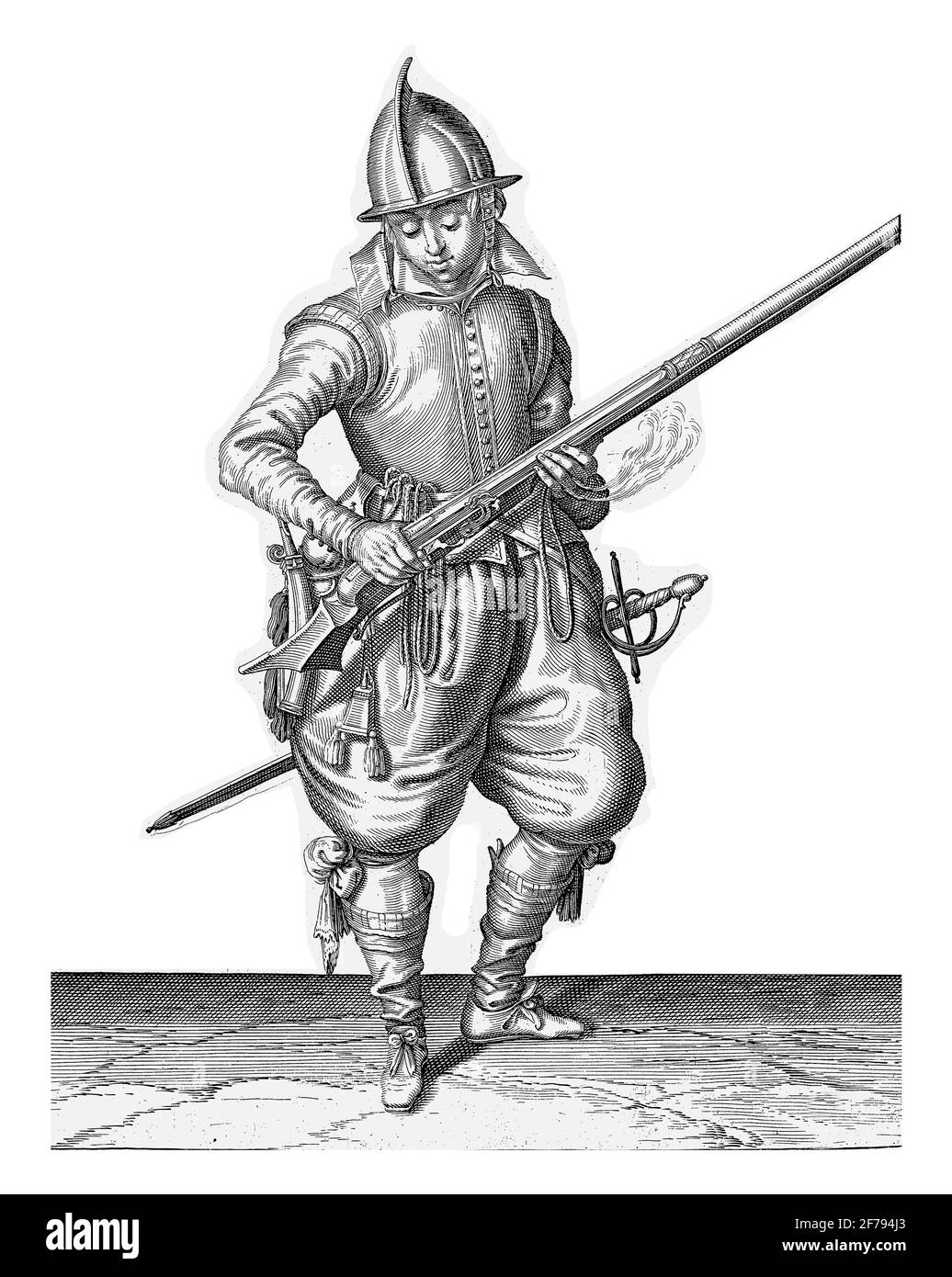 Un soldato, a tutta lunghezza, a destra, che scuote un timone (un certo tipo di arma da fuoco) con entrambe le mani, per rimuovere ogni polvere che vi è caduto Foto Stock