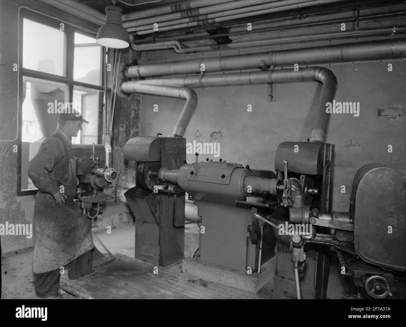 Lavoratori al Putsmaskin del Make Nydals. Foto Stock