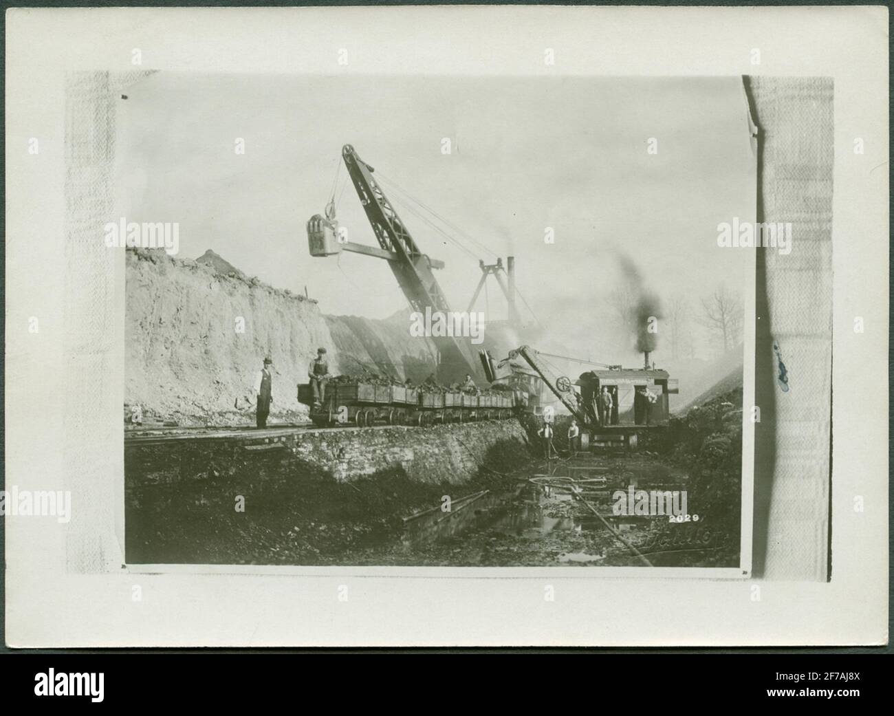 Lavora alla miniera di Kiruna. Caricamento su Järvägen. Sul retro dell'immagine, Gustaf Horn si erge. Foto Stock