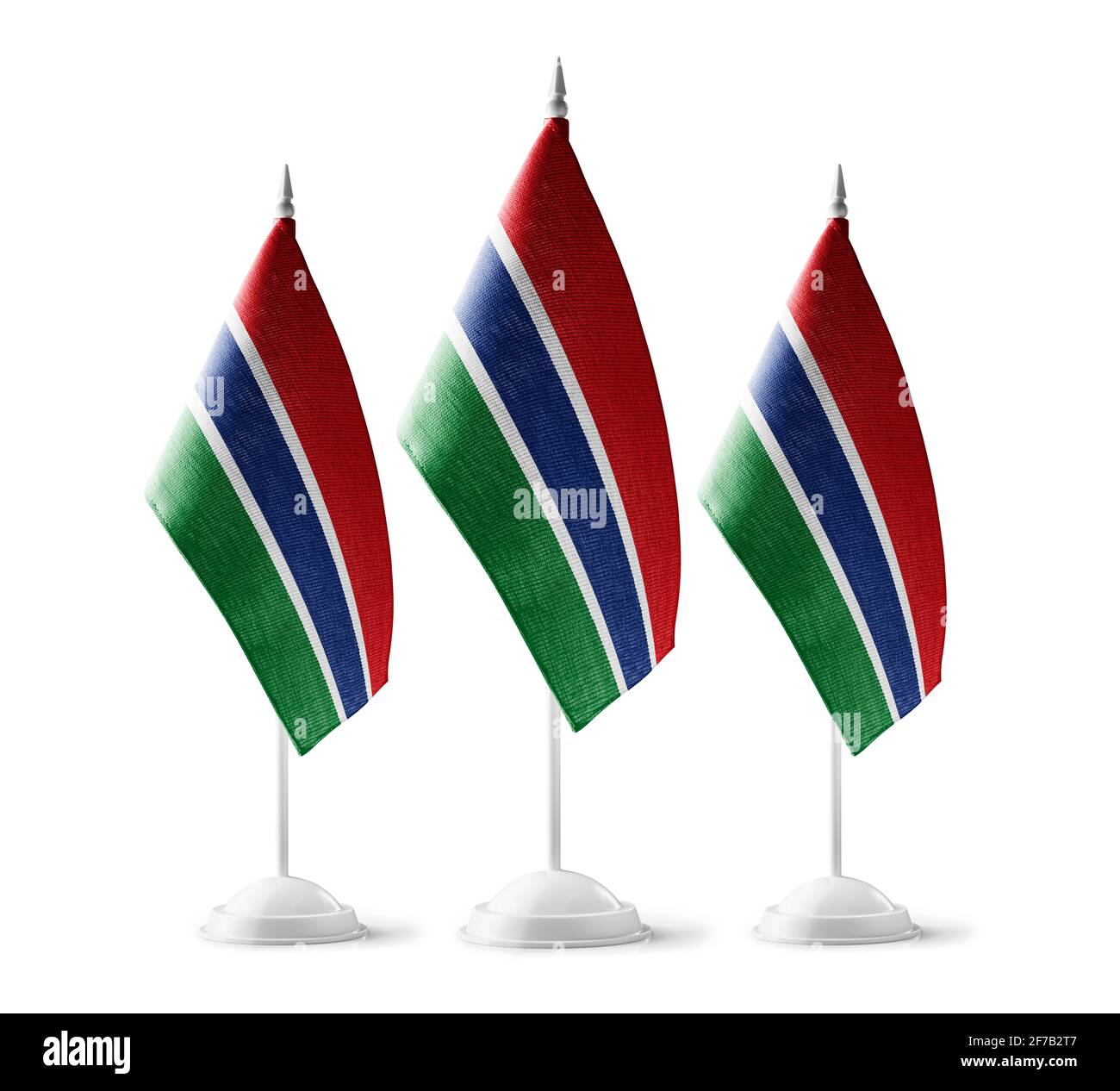 Piccole bandiere nazionali della Gambia su sfondo bianco Foto Stock