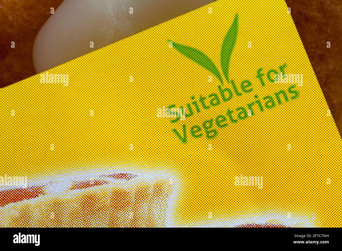 Adatto per vegetariani simbolo su confezione di mandorla di Frangipani belgi torte aromatizzate Foto Stock