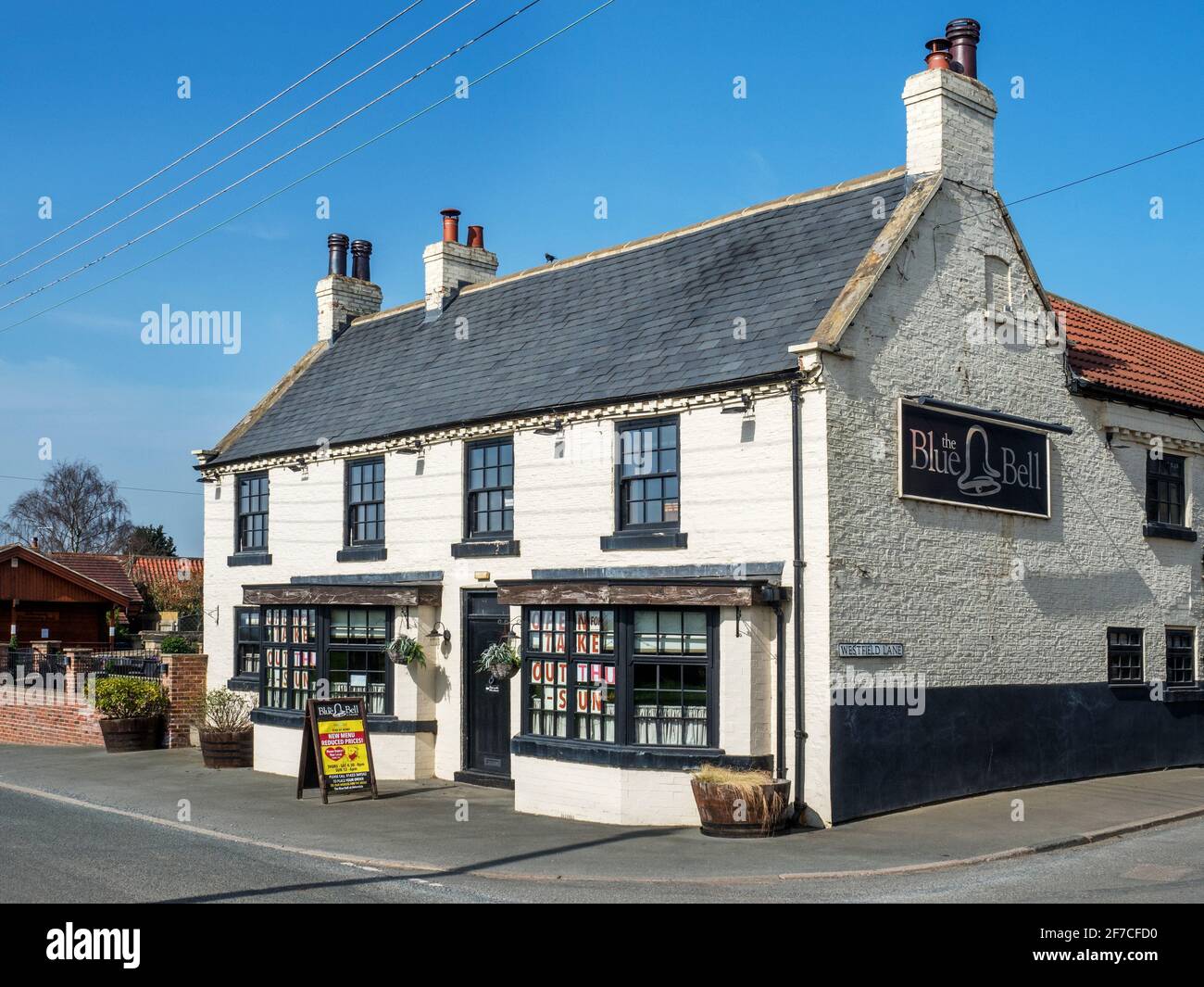 La casa pubblica Blue Bell nel villaggio di Arkendale Vicino a Knaresborough, North Yorkshire, Inghilterra Foto Stock